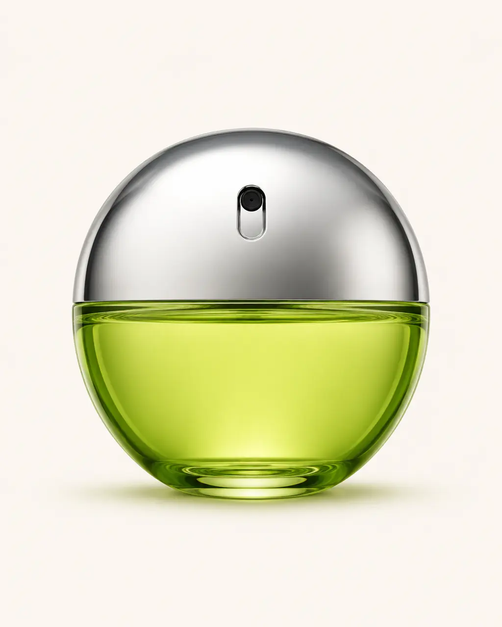 DKNY Be Delicious stilizált palackillusztrációja: szabályos, zöld almát idéző gömbpalack élénk zöld üvegtesttel, polírozott ezüstszínű félgömb felső résszel és középre helyezett szórónyílással.